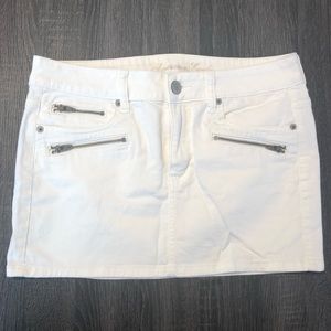 White stretch jeans mini skirt